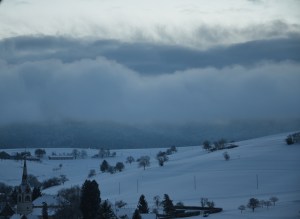 The fog rolls in over the village of Schleitheim, SH in Switzerland.